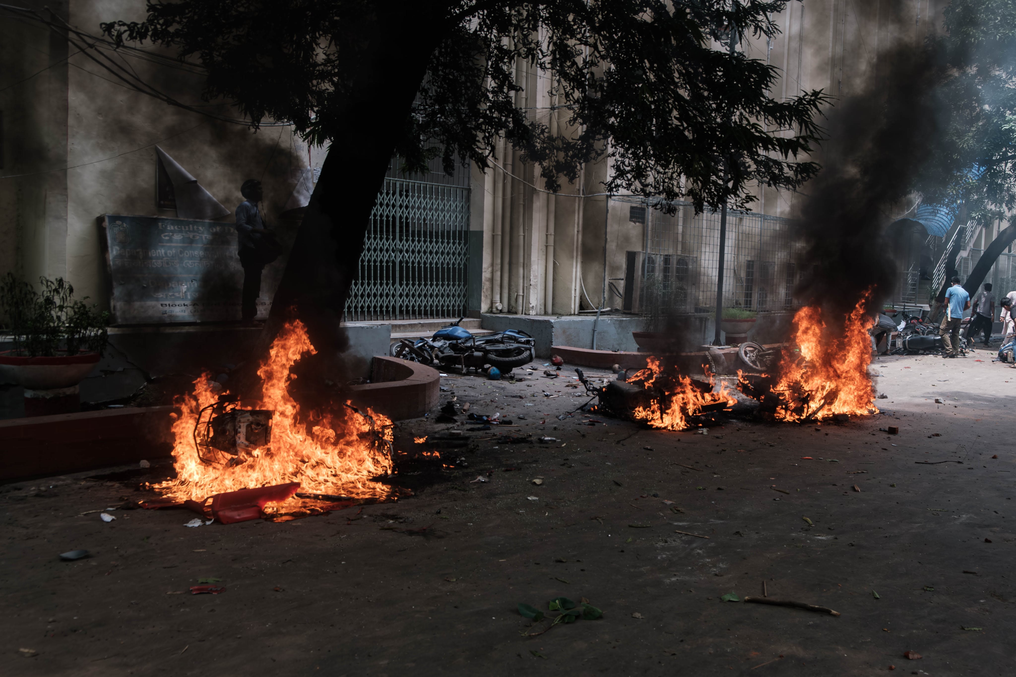 Burning police motorcycles due to the civil disobedience in Bangladesh to demand the government's resignation. Image Credits: Abul Hayat Rahadh.